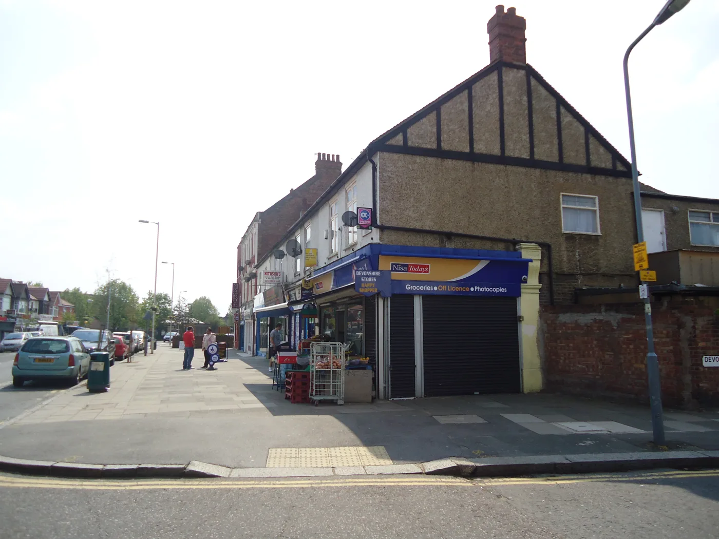 Shops on Aldborough Road South, Seven Kings, the road the school stands on. The picture does not show the school.